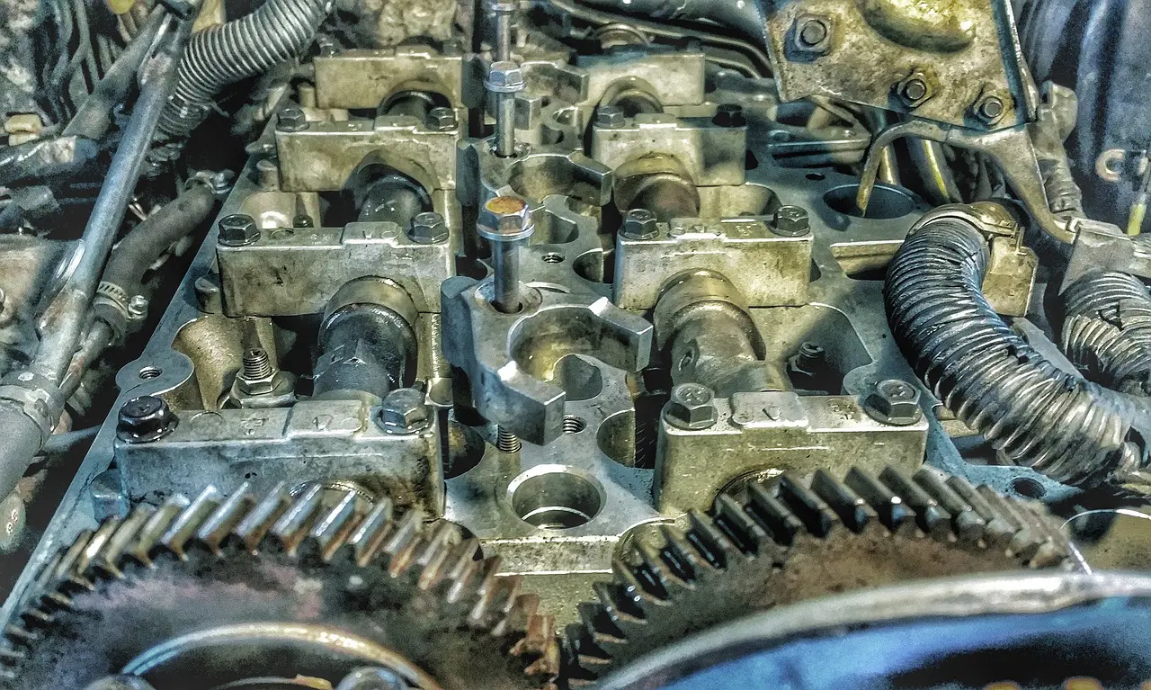 A close up of the engine block and gears.